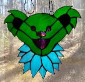 stained glass dancing bear
